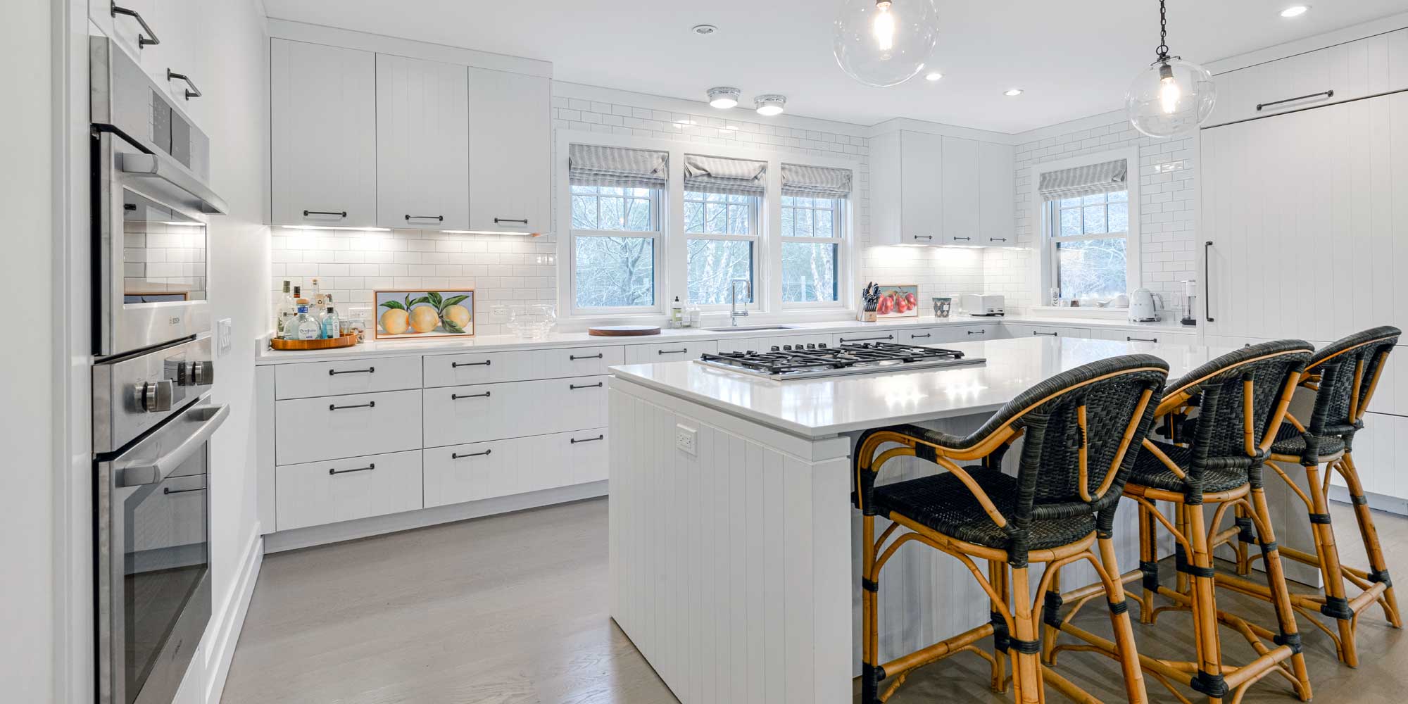 Coastal kitchen interior design with natural light and soft blue accents – Bella Coze Home