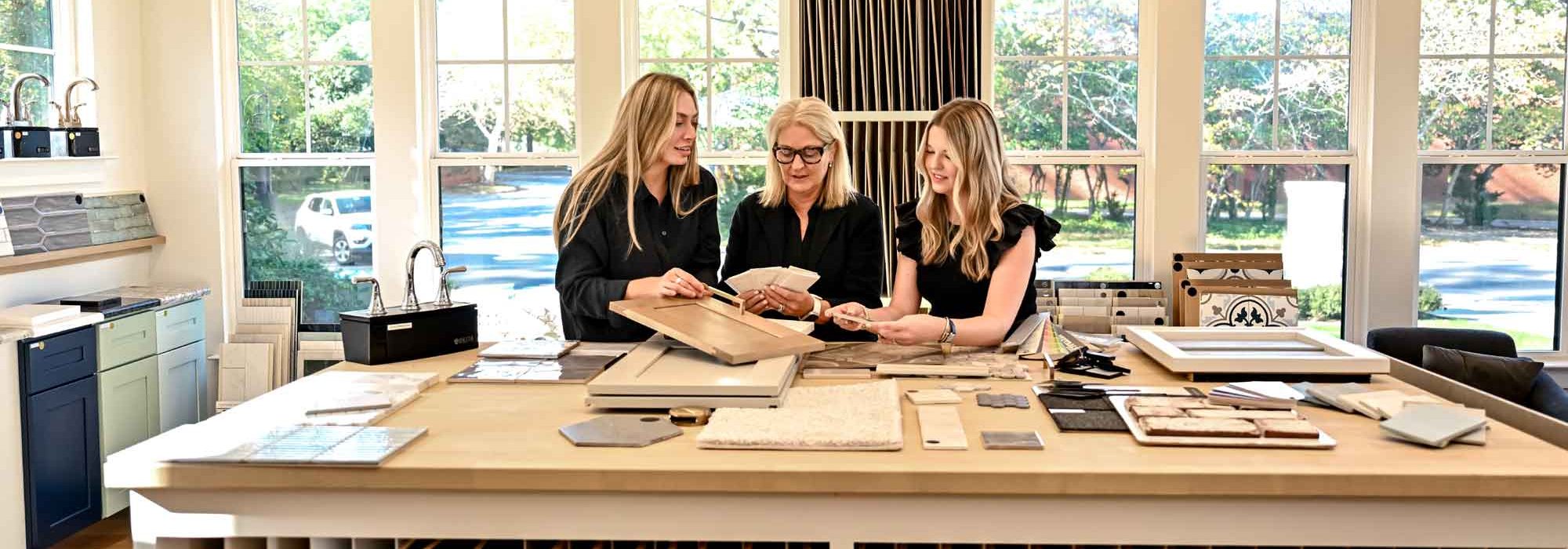 Bella Coze Team Reviewing Materials