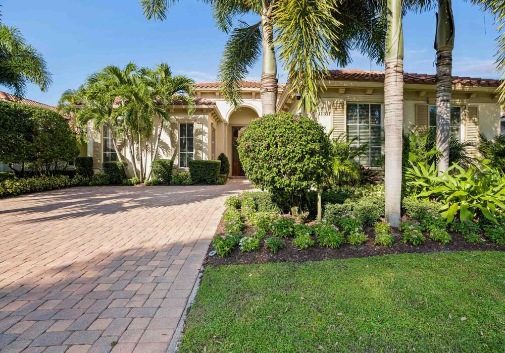 Luxury Old Palm home exterior in Palm Beach